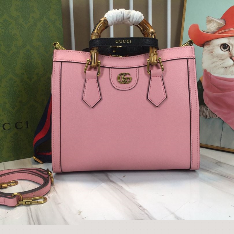G*u*i top handle bags
